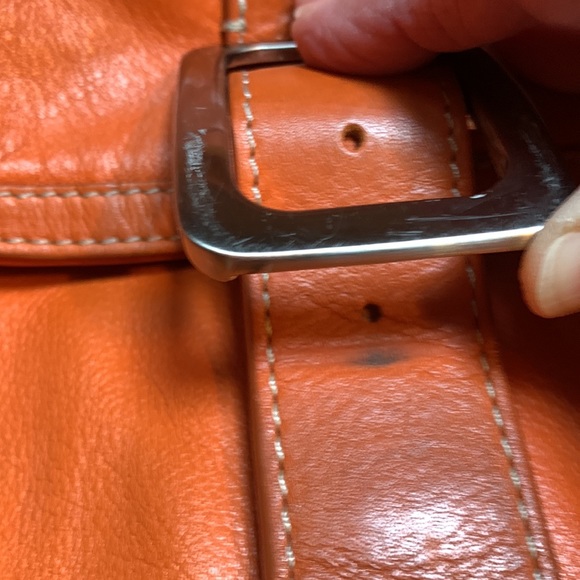 Cole Hahn orange handbag with fringe and silver hardware. - Picture 7 of 16